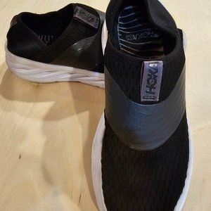 Hoka One One Women's Slip on shoes. Size 9, black w/white colored soles.